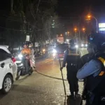 Tim Patmor Polresta Mamuju Sigap Tangani Kemacetan Akibat Kabel Putus di Simpang 4 Taman Karema